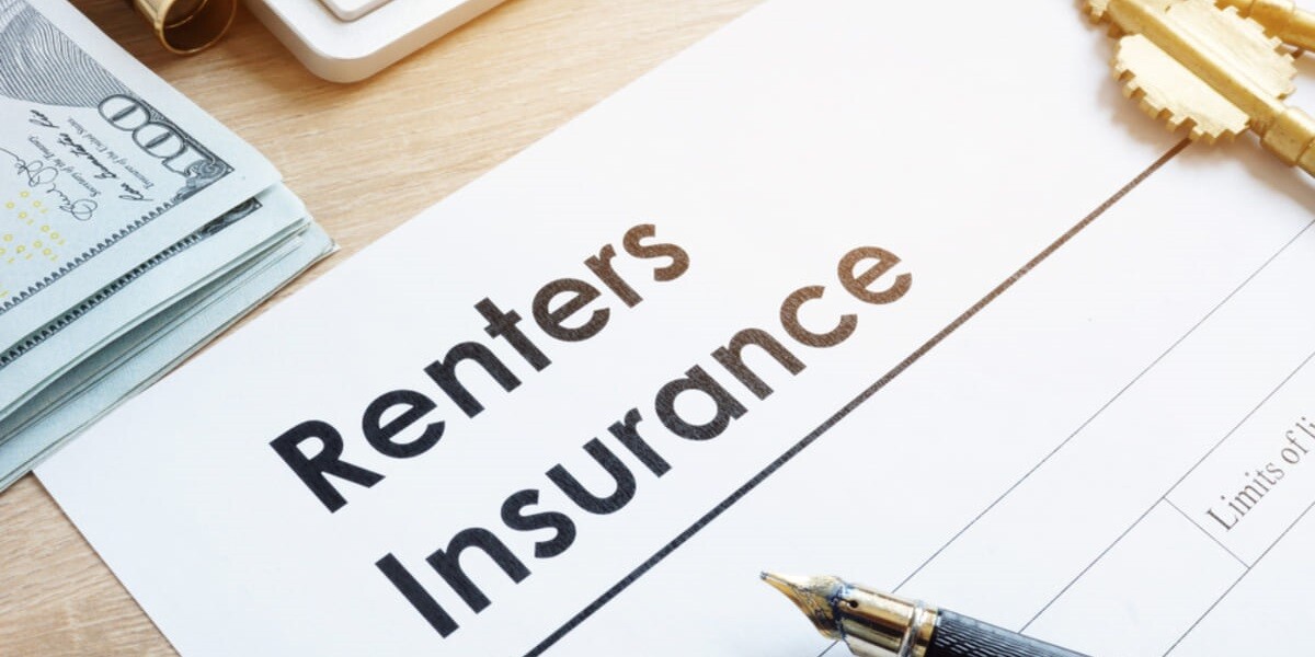 document that says renters insurance next to keys and cash - featured_image